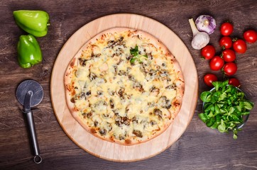 Thin pizza with mushrooms and cheese