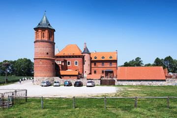 View of 15th century Gothic castle in Tykocin after the reconstruction work. The Castle located on the right bank of Narew river in Tykocin, Podlasie, Poland.