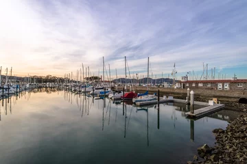 Tuinposter San Francisco Marina Yacht Harbor at Sunset - San Francisco, California, USA © diegograndi