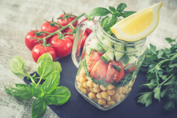 fresh vegetarian salad of chickpeas and vegetables