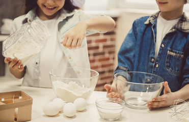 Children baking in kitchen