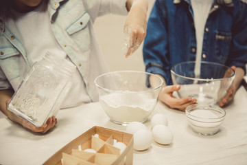 Children baking in kitchen