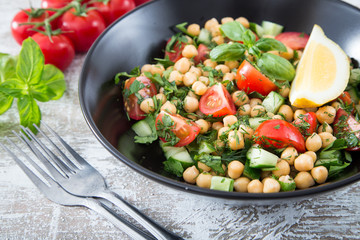 fresh vegetarian salad of chickpeas and vegetables