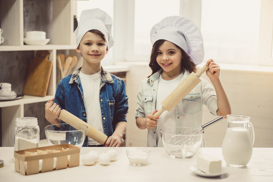 Children baking in kitchen