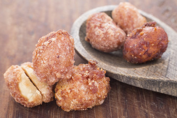 sugared peanuts on the wooden background