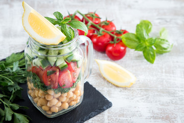 fresh vegetarian salad of chickpeas and vegetables