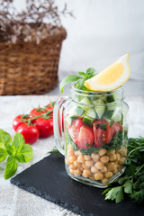 fresh vegetarian salad of chickpeas and vegetables