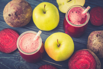 Healthy fresh detox beetroot and apple juice in glass