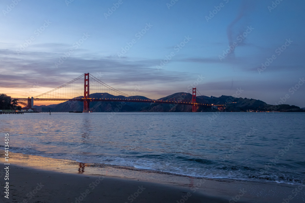 Wall mural beach and golden gate bridge at sunset - san francisco, california, usa