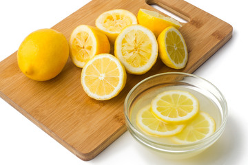 Lemons and juice on white background
