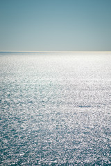 Abstract blurry effect sunny water surface, natural outdoors background, defocused backdrop photo