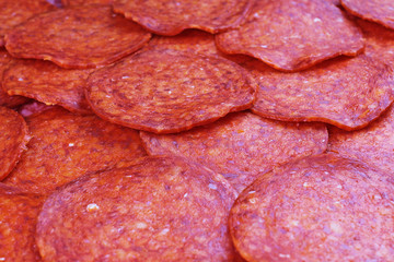 Red meat sausage sausages closeup texture studio photo.