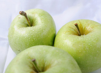 Green apple on a white background