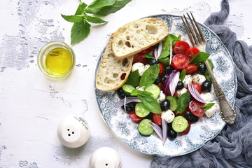 Mediterranean vegetable salad with olive oil.Top view.