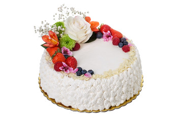 Delicious creamy cake of flowers and fruits.