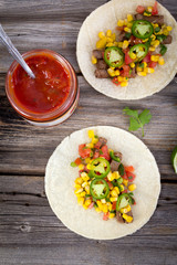 beef corn soft taco on rustic wood table