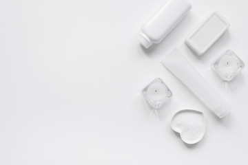 white set of cosmetic creams for spa on table top view mockup