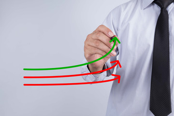 Benchmarking and market leader concept. Manager (businessman, coach, leadership) draw graph with three lines, one of them represent the best company in competition.