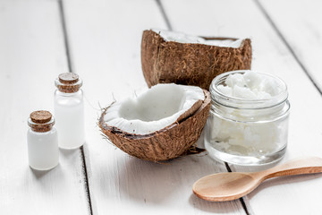 organic cosmetics concept with coconut on table background