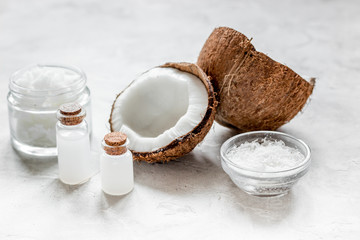 organic cosmetics concept with coconut on table background