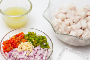 Peruvian ceviche preparation : Blanched fish, lemon juice and chopped vegetables