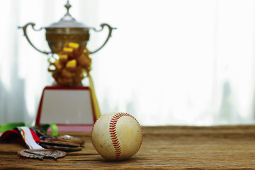 Stock Photo - Baseball with gold Trophy Cup