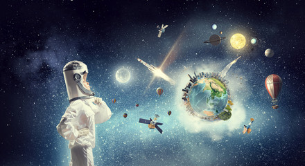 Obraz na płótnie Canvas Dreaming to explore space . Mixed media . Mixed media