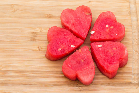Watermelon on  wooden background.