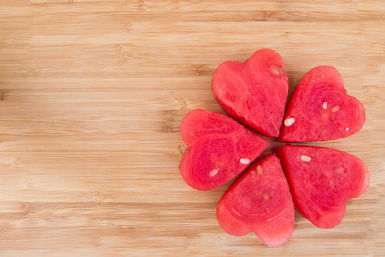 Watermelon on  wooden background.