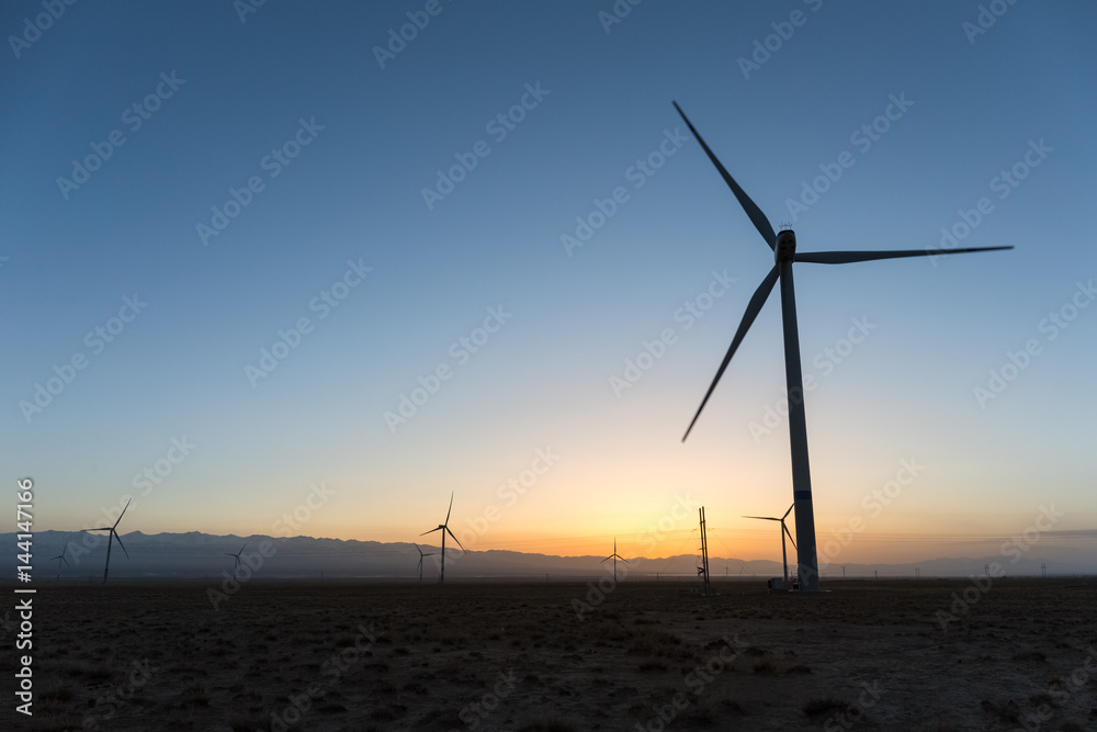 Poster wind farm in sunset