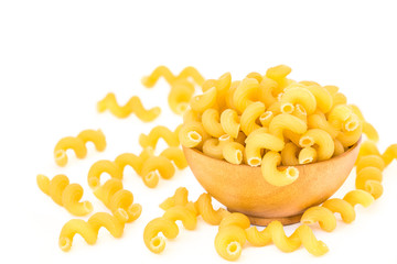 Raw Italian Macaroni Pasta  on wooden bowl.