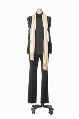 full-length female dress with scarf and trousers isolated on a dummy 

