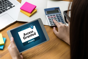 Access Granted Anytime Available Businessman working at office desk and using compute Possible Unlock