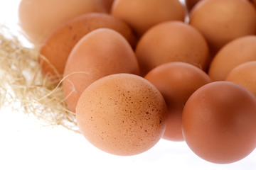 Isolate Close up Hen Eggs Lay on Straw