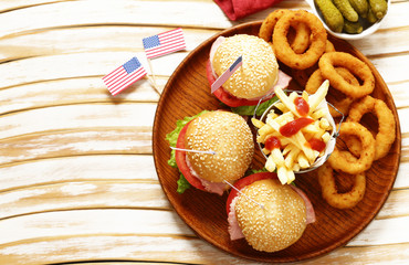 Burger, french fries and onion rings food for the celebration of July 4