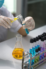 Scientist doing chemical test in laboratory