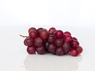 Ripe red grape isolated.