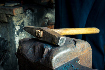 hammer and anvil in smithy