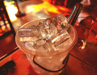 Ice bucket, bucket with ice on a Hot background