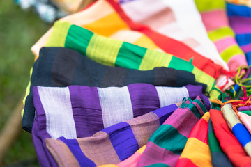 Stack of colourful silk scarfs