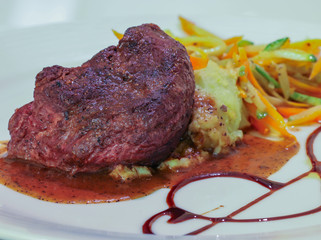 Beef steak red wine sauceand vegetables.