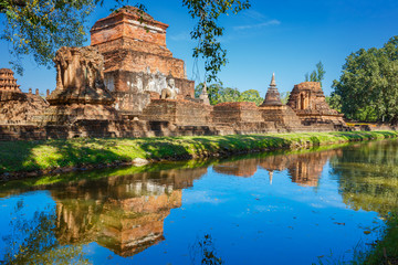 Fototapeta na wymiar Wat Mahathat Temple in the precinct of Sukhothai Historical Park, a UNESCO world heritage site in Thailand