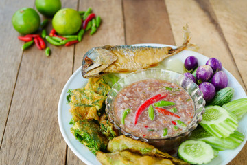 Fried mackerel with shrimp paste sauce and  boiled or deep fried vegetables
