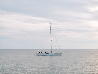 Fototapeta na wymiar Yacht in the Adriatic sea in Montenegro, in the Balkans
