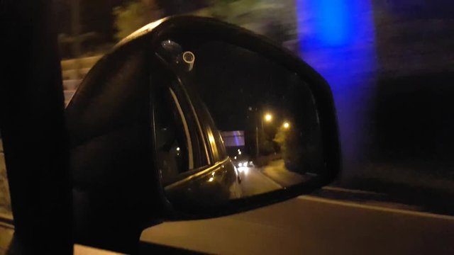 Pictures from inside a police car. "Real sound of sirens"
