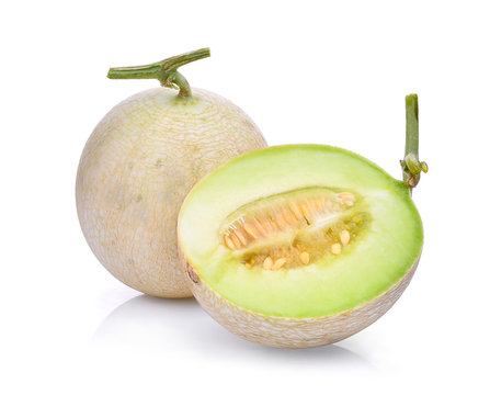green cantaloupe melon isolated on white background