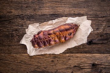 Pork meat.Pork chop smoked. Traditional smoked meat on oak wooden table in other positions.
