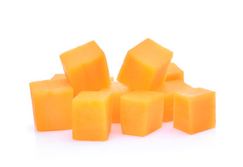 fresh papaya cubes isolated on white background