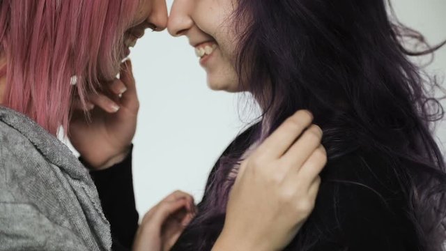 Couple lesbian women kissing