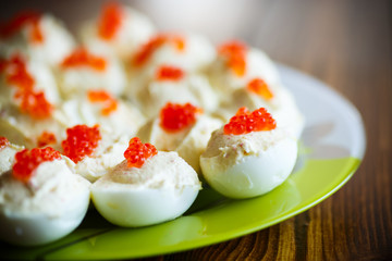 Eggs stuffed red caviar